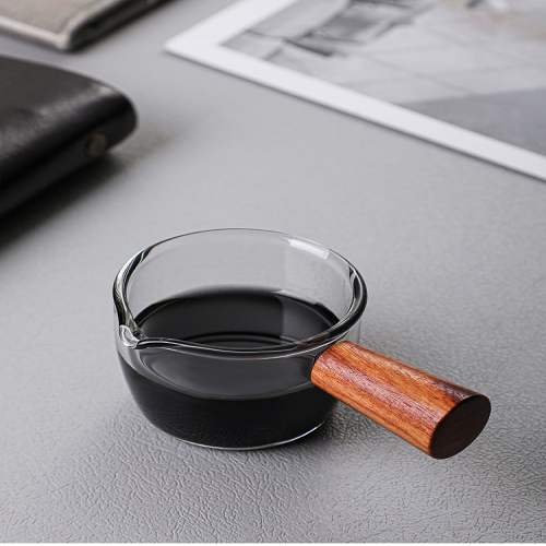 كنكة بيد خشب