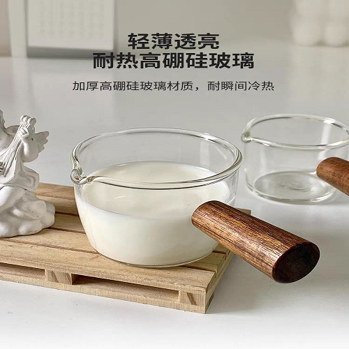 كنكة بيد خشب