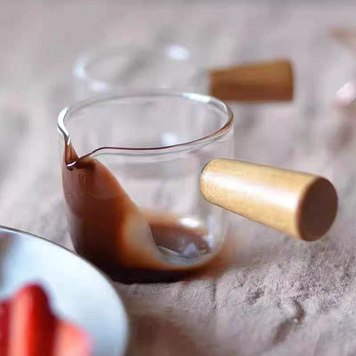 كنكة بيد خشب