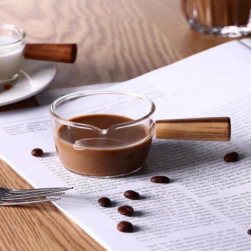 كنكة بيد خشب