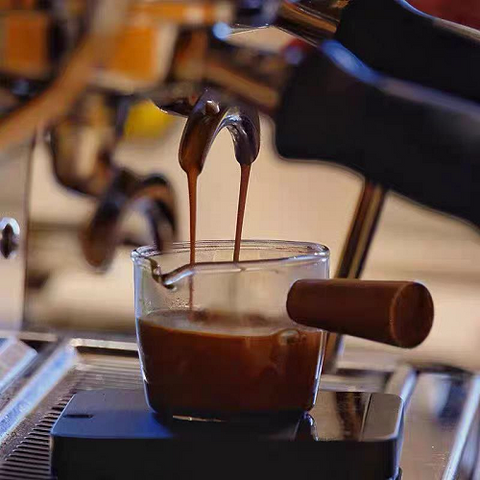 Image of كنكة بيد خشب