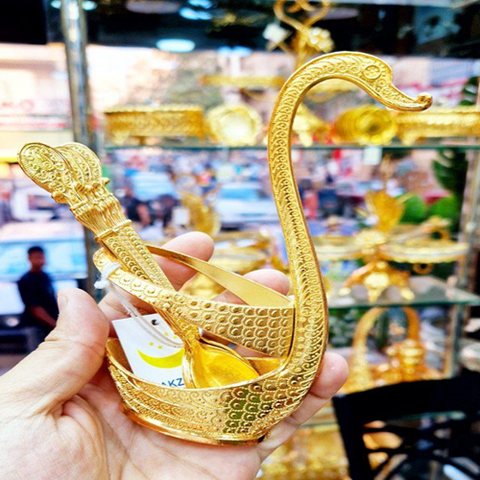 Image of طقم معالق صغيرة بحامل شكل بجعة