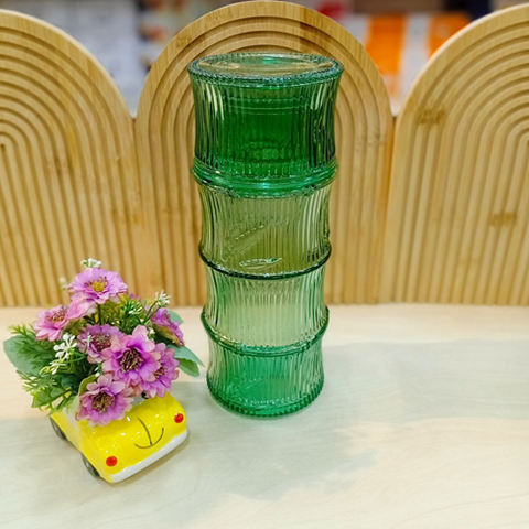 Image of زجاجة بالكوب باللون الأخضر