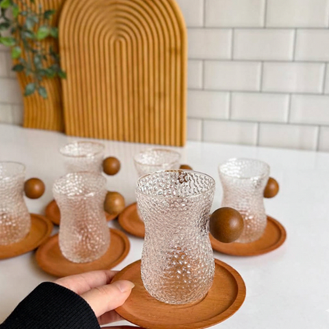 Image of طقم فناجين بيد خشب 12 قطعة بالكوستر