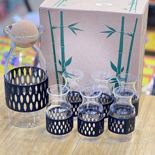 طقم قارورة زجاج بإطار جلد 7 قطع