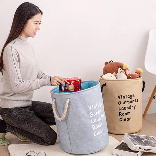 سلة غسيل بيد